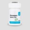 Buy blue label Diazepam 2mg tablets for sale online USA to manage anxiety effectively. Buy Diazepam 2mg bottles for sale online USA featuring a white container for secure storage. Buy Diazepam 2mg tablets for sale online USA on grey background to assist with muscle relaxation.