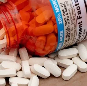 Buy ketamine pills for sale online Australia for fast relief, showing white caplets beside an orange bottle. Buy white ketamine pills for sale online Australia for targeted pain management, spilling from an open bottle. Buy oral ketamine pills for sale online Australia for improved wellness, shown as white tablets by a bottle.